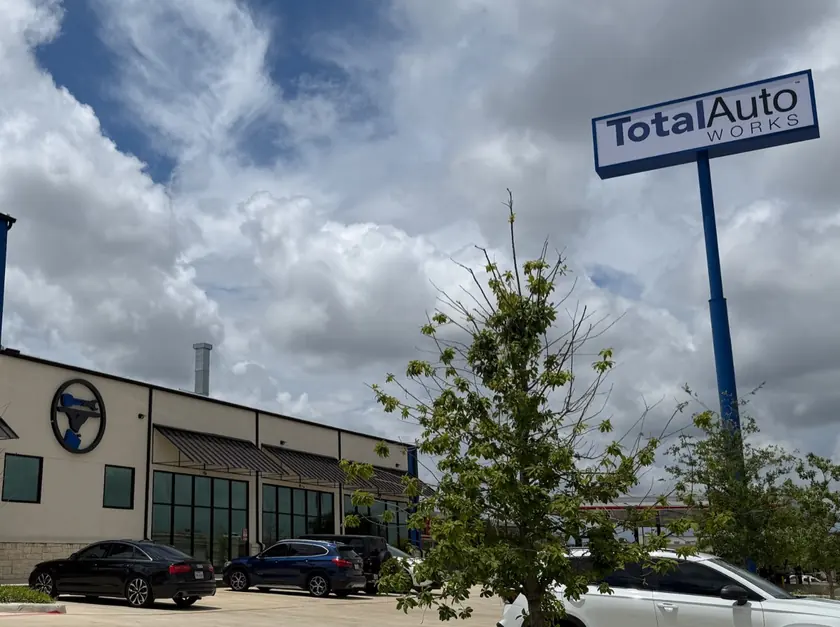 Exterior of the Total Auto Works building and sign in Austin, Texas